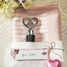 cadeaux invites mariage theme argent et rose poudre, boucheau de bouteille forme de coeur